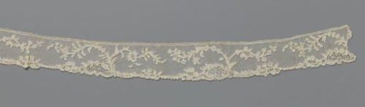 Strip of needle lace with high and broadly spreading split flower branches