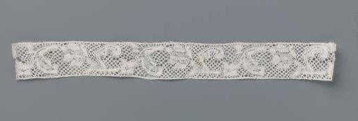 Insert of bobbin lace edge with waving flower stems