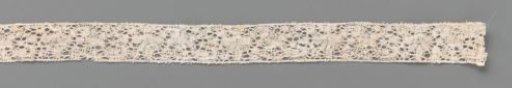 Strip of bobbin lace with palmettes