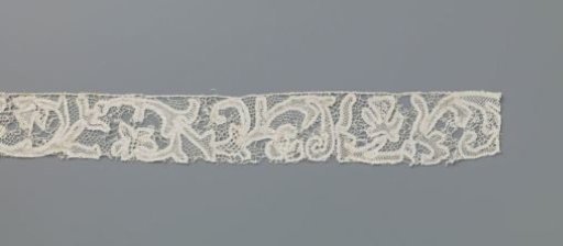 Strip of needle lace with three wave crests