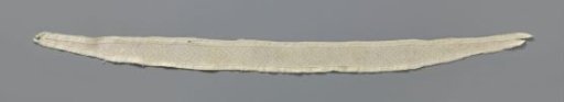 Strip of buttonwork with small and large squares