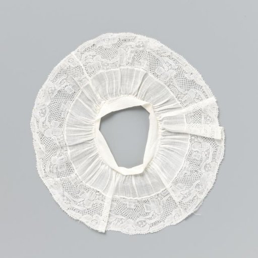 Child's cuff of white linen and bobbin lace