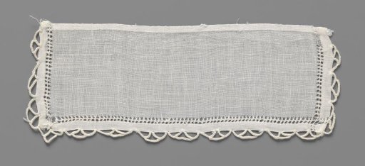 Cuff of linen batiste finished on three sides with open hems and a scalloped edge of crocheted lace