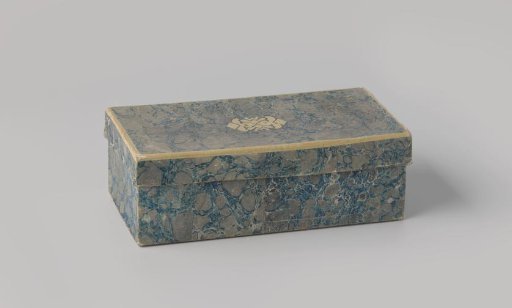 Cardboard box covered with blue marbled paper, with a pattern cut out on the lid; a birth cushion was kept in the box