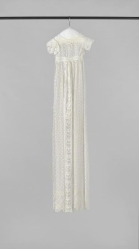 Baptism dress of fully embroidered batiste with a wide band of Brussels lace