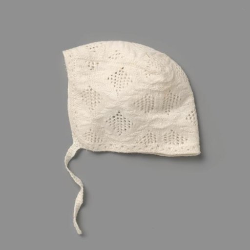 Girls' Cap of Fine Cotton Knitting, with Openwork Diamond Motifs Surrounded by Knitted Decorative Borders; Knitted Ribbon Tie