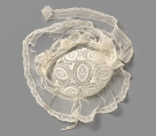Children's Cap of Tulle with Seven Medallions of Valenciennes Lace and Embroidered Batiste with Floral Motifs