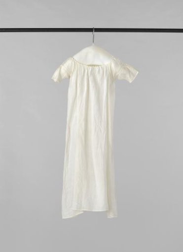 Baby shirt of linen, decorated with open hems, with short sleeves