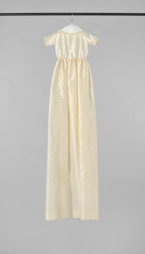 A 'baptism' dress underdress of ecru-coloured silk, decorated with strips of Valenciennes lace