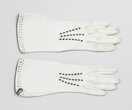 Pair of gloves with embroidered seams