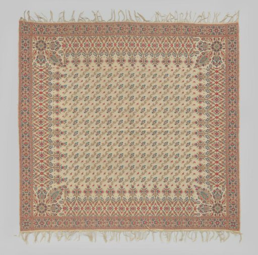 Square cashmere scarf with red, blue and beige scattered pattern on white field and a band along the edge