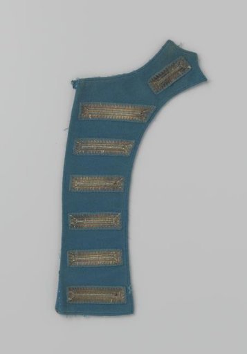 Lapel of blue cloth with seven appliqués of silver embroidery