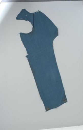 Piece of blue fabric with two heart-shaped appliqués in silver thread with leaves