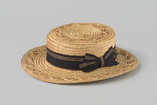 Straw hat of coarse straw band in natural colour with woven beige ribbons