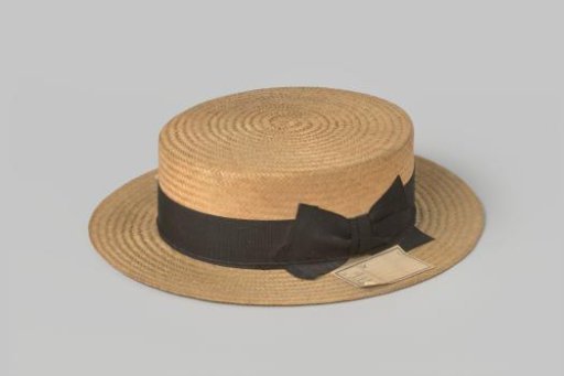 Hat of natural-colored braided straw with a flat crown, around which a black grosgrain ribbon with a flat bow, and a wide straight brim