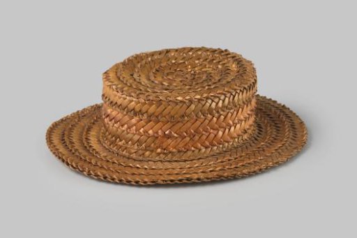 Hat of very coarse, light-brown straw braid with flat crown and wide straight brim