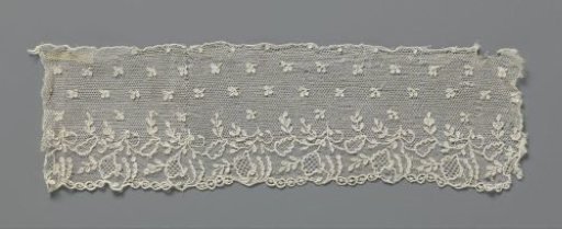 Strip of needle lace with clover leaves and fan-shaped flowers