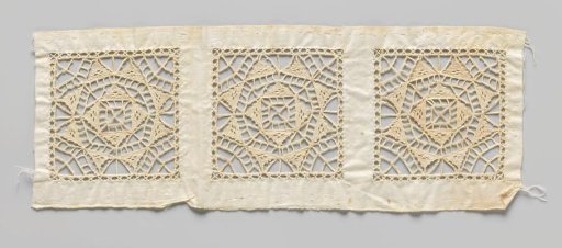 Work in progress of three squares placed side by side in reticella (lace embroidery) on a strip of cotton