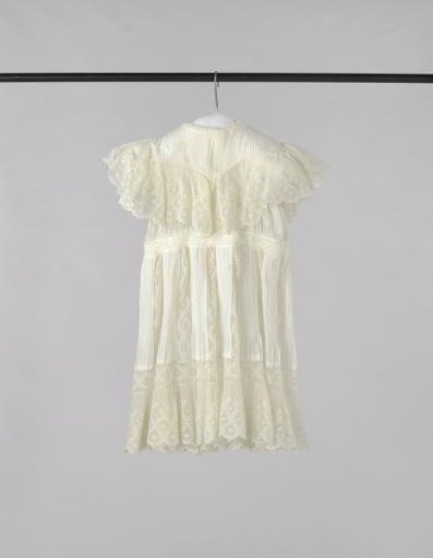 Girl's dress of batiste and imitation Valenciennes lace, decorated with pelerine collar