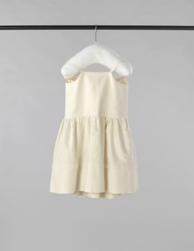 A toddler's petticoat "monkey jacket" of sturdy twill cotton, without ornament