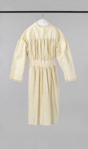 A Girls' Nightgown, or Sleeve Apron, of White Linen with Narrow Imitation Lace, with Fixed Inserted Ribbon Sash
