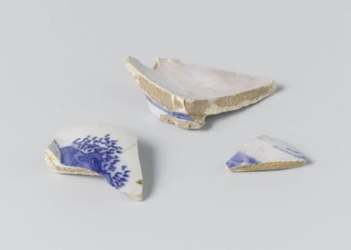 Fragment, three pieces, of a blue-painted vase