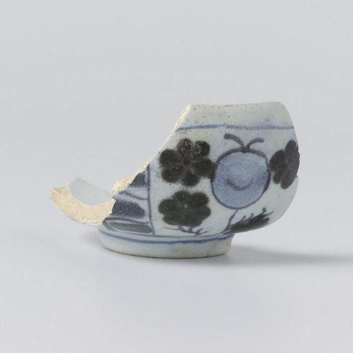 Cup, fragment, with blue floral motifs.