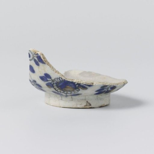 Cup, fragment, with blue floral motifs.