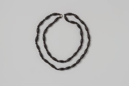 Necklace of black wooden beads, alternating round and oval