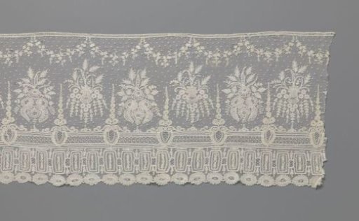 Strip of appliqué lace with bouquets and triple ornamental border