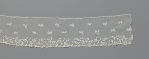 Strip of appliqué lace with bellflowers and a wavy flower branch