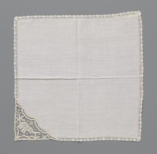 Handkerchief of batiste finished around with a border of bobbin lace with an elephant in one corner