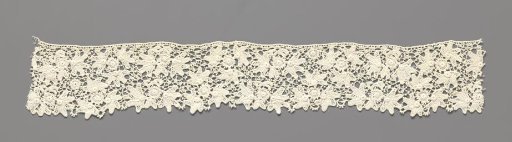 Strip of Crocheted Lace with Hand-Shaped Leaves around Circular Medallion