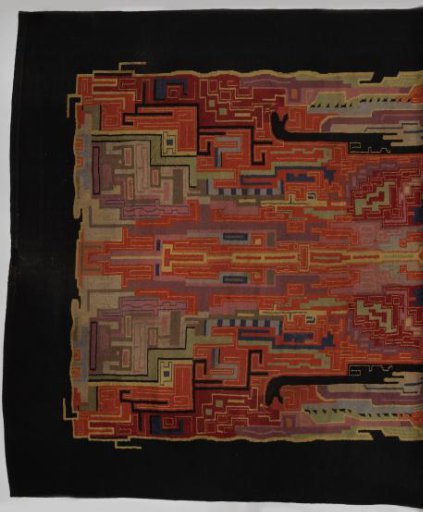Carpet with a colorful Art Deco pattern within a black border