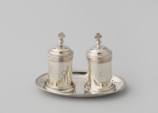 Silver chrismatorium, consisting of two small boxes on an oval leaf