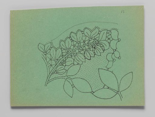 Lace pattern for a garment of bobbin lace with golden vine branches and flowers