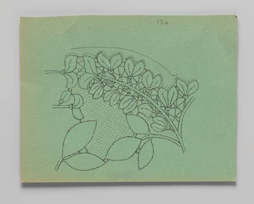 Lace pattern for a garment of bobbin lace with golden vine branches and flowers
