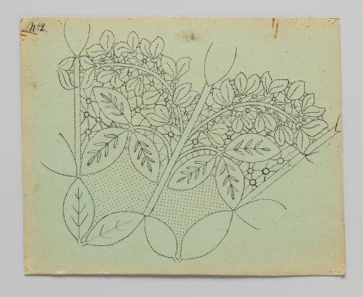 Lace pattern for a cloth of bobbin lace with golden vine branches and flowers
