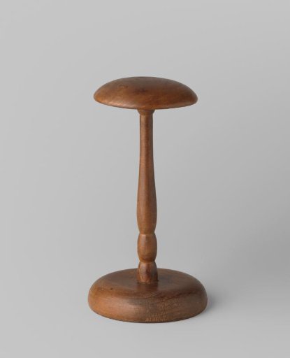 Hat stand of dark brown varnished wood
