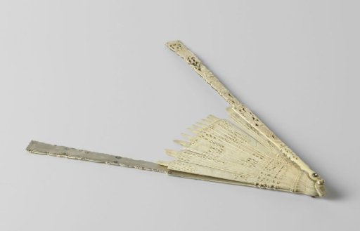 Ivory mount pierced and carved in relief, with three cartouches containing Rococo ornaments featuring a fruit bowl and gardening tools