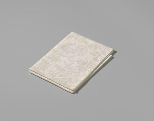 Linen damask napkin with a floral pattern