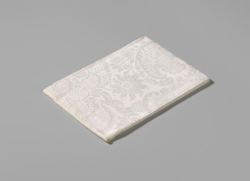 Linen damask napkin with a lace pattern
