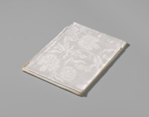 Linen damask napkin with a floral pattern