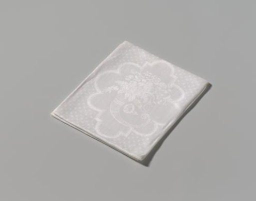 Linen damask napkin with a floral pattern