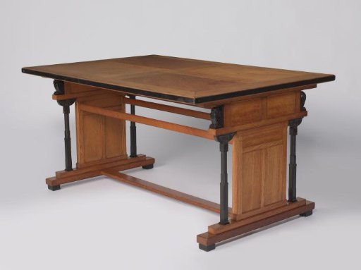 Table with carved insects and owls