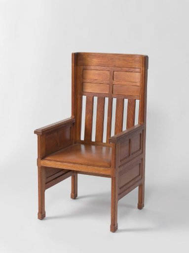 Armchair with rounded back and brown leather upholstery