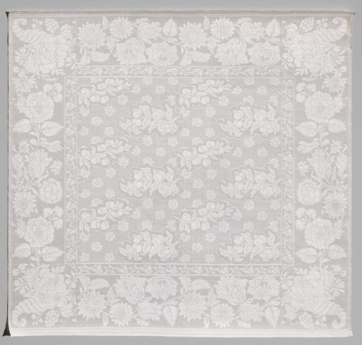 Linen damask napkin with a floral pattern