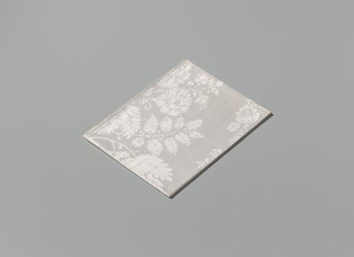 Linen damask napkin with a lace pattern