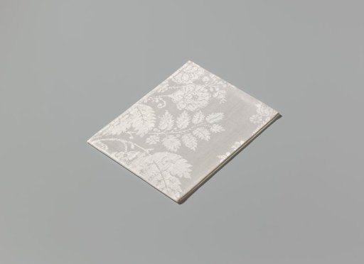 Linen damask napkin with a lace pattern