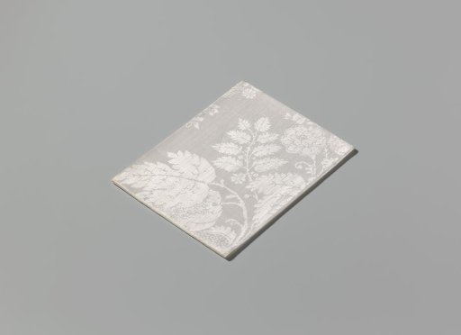 Linen damask napkin with a lace pattern